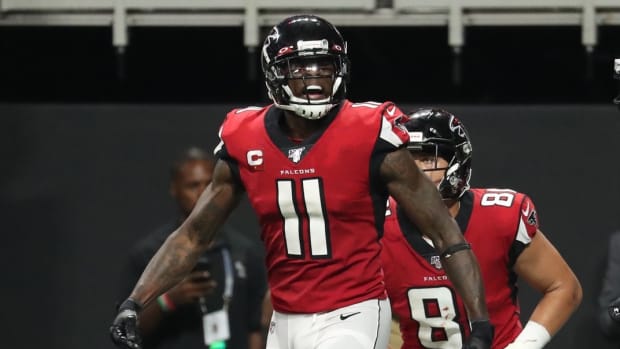 Atlanta Falcons wide receiver Julio Jones (11) reacts after scoring the game-winning touchdown in the fourth quarter against the Philadelphia Eagles at Mercedes-Benz Stadium.
